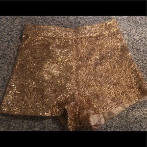 Sequence gold high waisted shorts. Size M.